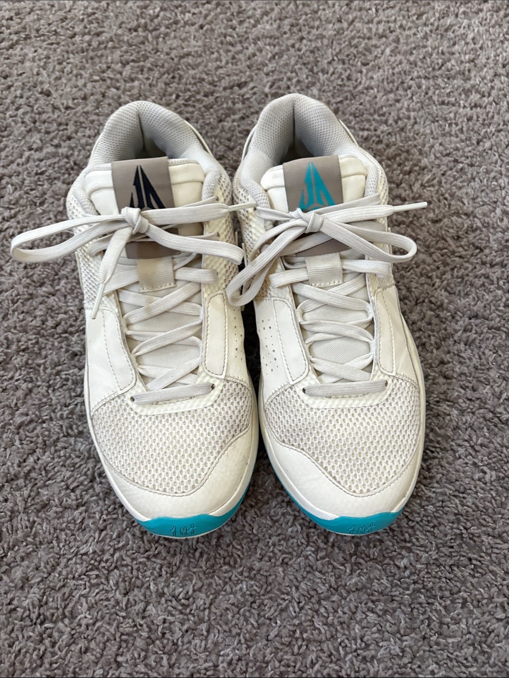 White Ja Morant Basketball Shoes with Teal Accent